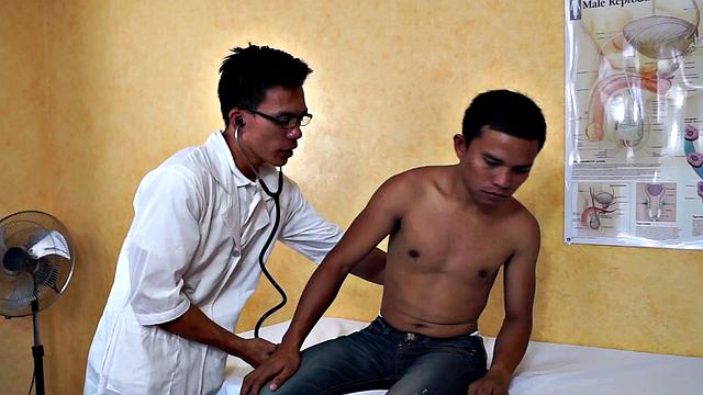 Slim Asian bottom fingered by medic before bareback sex