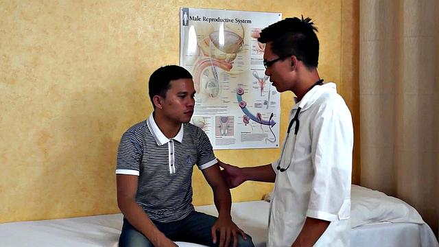 Slim Asian bottom fingered by medic before bareback sex