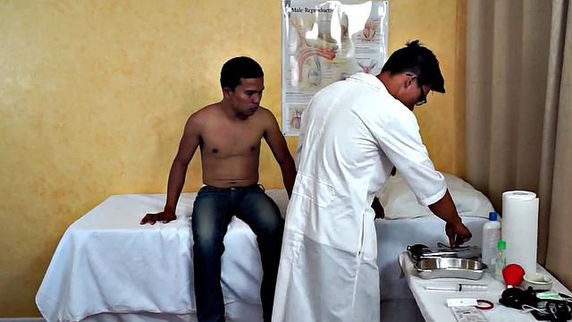 Slim Asian bottom fingered by medic before bareback sex