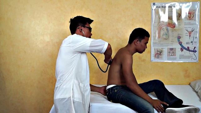 Slim Asian bottom fingered by medic before bareback sex