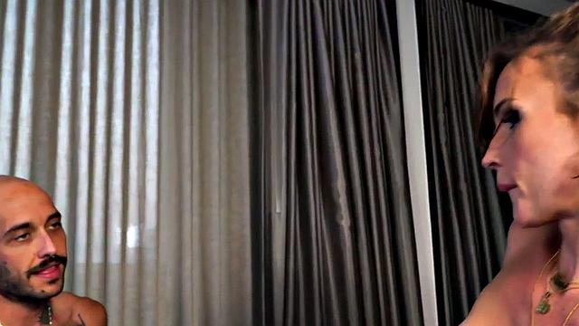 Trans guy gets licked by busty Tranny MILF in heels