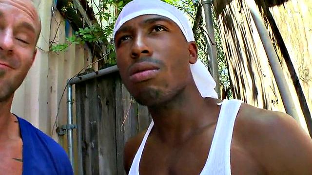 Watch this hot interracial pornstar take it in the ass from a white guy's topless tank top