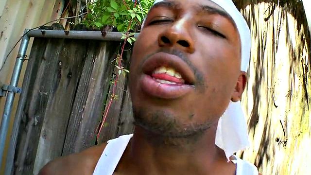 Watch this hot interracial pornstar take it in the ass from a white guy's topless tank top