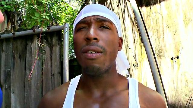 Watch this hot interracial pornstar take it in the ass from a white guy's topless tank top