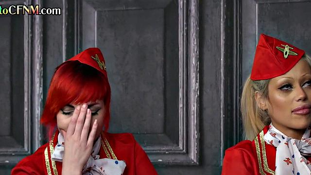 CFNM stewardess in uniform sucking and wanking pilot together