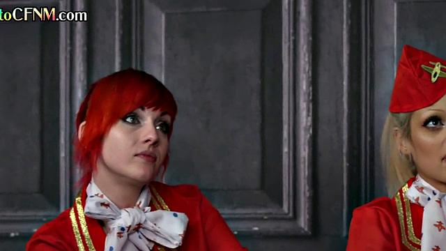 CFNM stewardess in uniform sucking and wanking pilot together