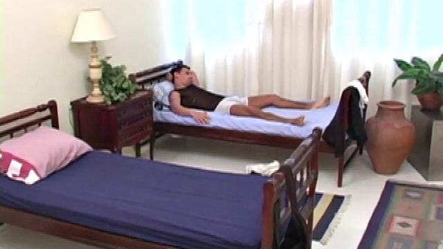 Darien Leon is in bed when Leon Pavia returns from school. The two Latinos love each other very much, and quickly strip naked. After some and chest licking, Darien pulls Leon's whopper cock out of his pants for an aggressive blow.