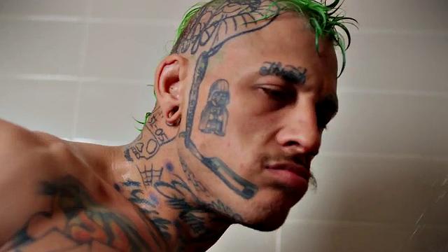 Inked hunk fucking twink in shower after blowjob