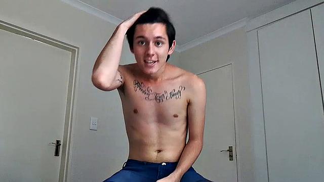 Ant is a slim and smooth twink, with that boy next door look, until the shirt peels off revealing an inked chest. He pushes his shorts down just enough to give us a peek at his fine looking little butt and big uncut cock.