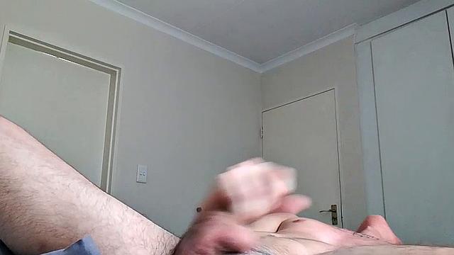 Ant is a slim and smooth twink, with that boy next door look, until the shirt peels off revealing an inked chest. He pushes his shorts down just enough to give us a peek at his fine looking little butt and big uncut cock.