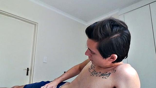 Ant is a slim and smooth twink, with that boy next door look, until the shirt peels off revealing an inked chest. He pushes his shorts down just enough to give us a peek at his fine looking little butt and big uncut cock.