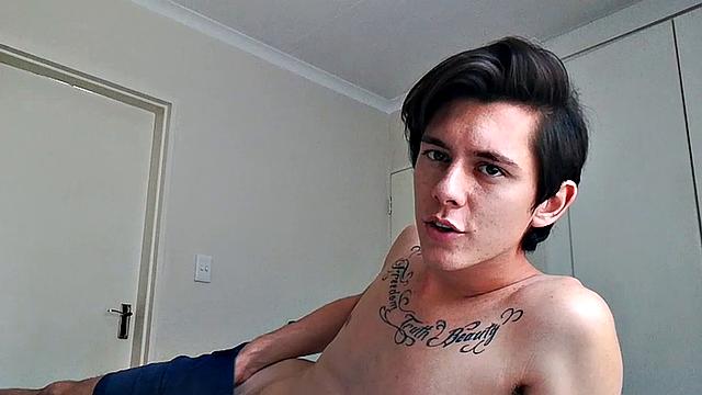 Ant is a slim and smooth twink, with that boy next door look, until the shirt peels off revealing an inked chest. He pushes his shorts down just enough to give us a peek at his fine looking little butt and big uncut cock.