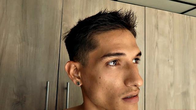 Shirtless Puma opens his pants to expose and gets big cock stiff.