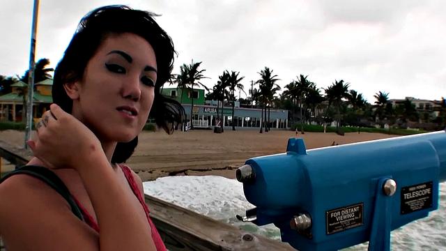 Brunette with a tattoo takes it hard from behind in a wild outdoor fuck session