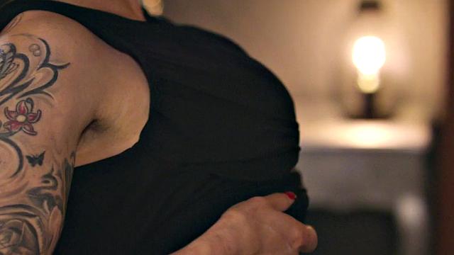 Watch this tattooed slut in stockings get her pussy drilled by her lover's big cock