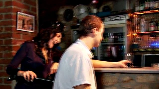 Uniformed dominas pegging and spanking sissy bartender's ass