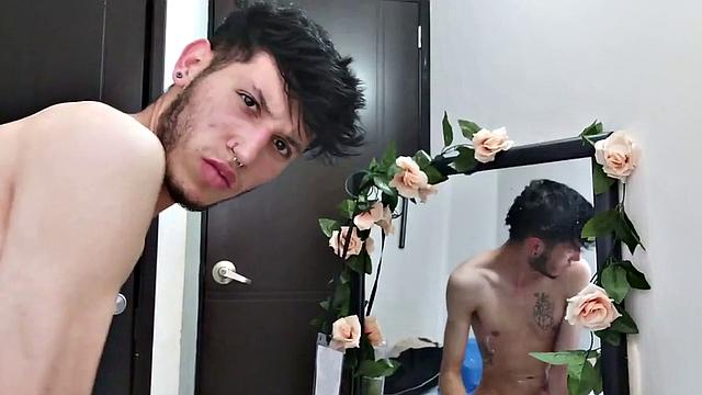 Pervert Boy is back and this time stands as clothes strip off, big uncut cock gets stiff. The skinny young man makes good use of a mirror, jerks off for us.