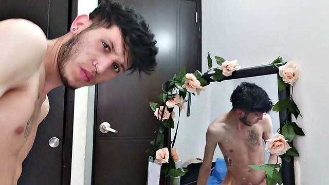 Pervert Boy is back and this time stands as clothes strip off, big uncut cock gets stiff. The skinny young man makes good use of a mirror, jerks off for us.