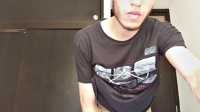 Pervert Boy is back and this time stands as clothes strip off, big uncut cock gets stiff. The skinny young man makes good use of a mirror, jerks off for us.