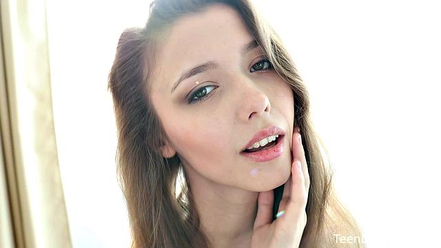 Mila Azul plays with her sweet treat and shows her wild side