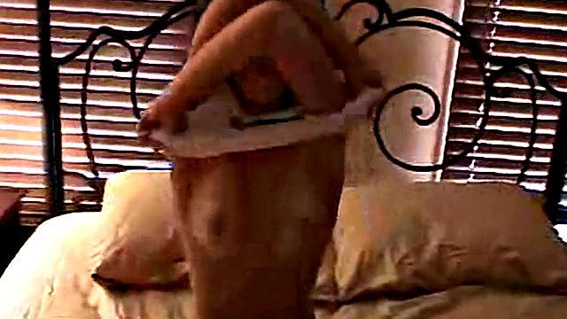 Hot teen fingers her pussy in masturbation