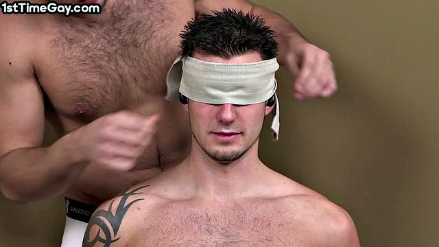 Blindfolded jock sucked by his lover