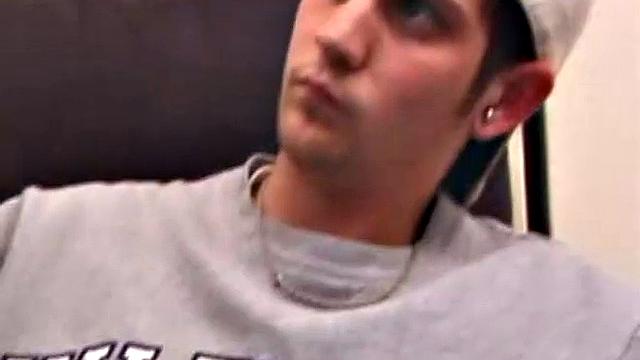 As a porn flick plays, young amateur Aaron Michaels strokes hard, pulls his cock out of his jeans, lets loose, and spills his nut on the bed.