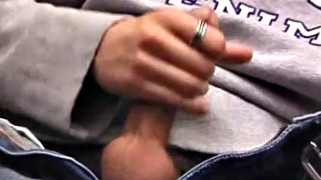 As a porn flick plays, young amateur Aaron Michaels strokes hard, pulls his cock out of his jeans, lets loose, and spills his nut on the bed.