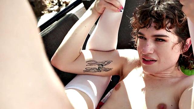 TS inked babe sucks before analfucking in doggy style outdoors