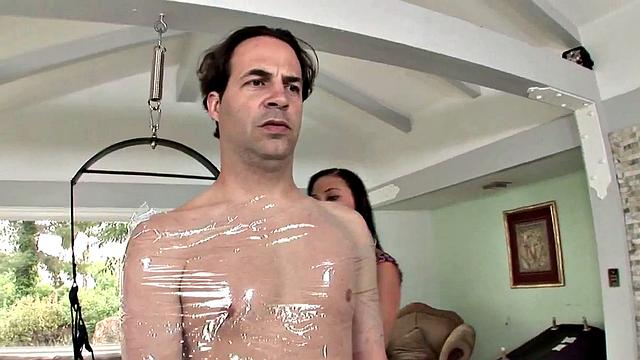 Ivy Winters Handjob with plastic strap