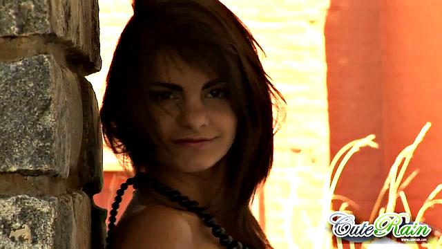 Gorgeous teen Rain shows off her hot body to the camera