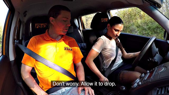 Tattooed brunette fucks for license