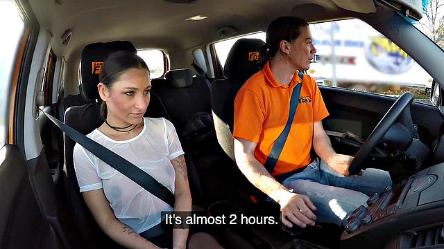 Tattooed brunette fucks for license