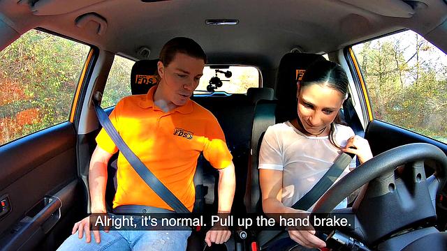 Tattooed brunette fucks for license