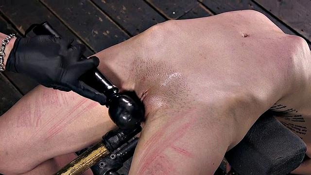 Trapped BDSM nympho whipped hardcore before squirting