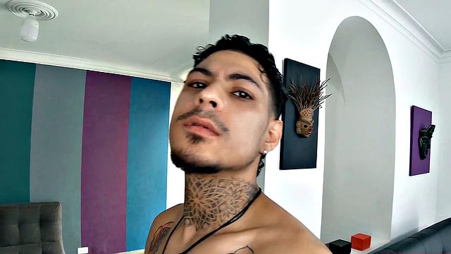 Jhon slowly strips naked, as he works up a stiff one. Once boned up, he sits on a sofa and the long stroke show begins. This horny Latin boy is all over that couch, as he nears climax.