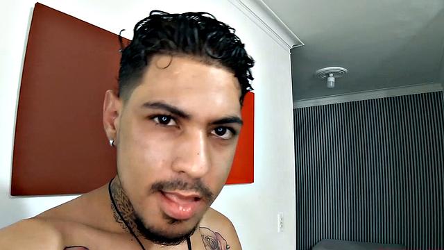 Jhon slowly strips naked, as he works up a stiff one. Once boned up, he sits on a sofa and the long stroke show begins. This horny Latin boy is all over that couch, as he nears climax.