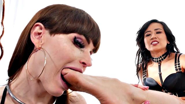 Submissive TS licks Asian domina's feet and gets strapon fucked