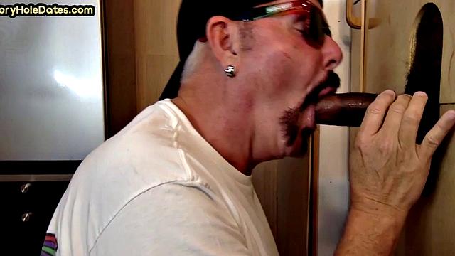 Gloryhole DILF sucks Black cock before getting fucked by white in sling