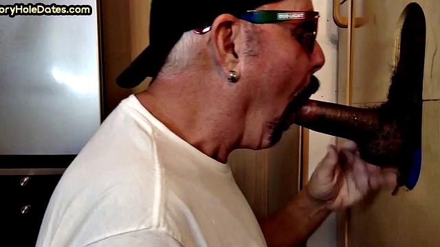 Gloryhole DILF sucks Black cock before getting fucked by white in sling