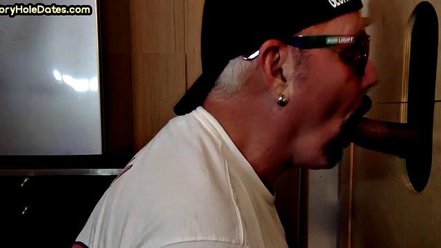 Gloryhole DILF sucks Black cock before getting fucked by white in sling