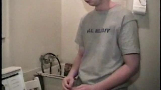 Boy-next-door spreads his new straight porn magazine on top of the washing machine and pulls his cock out of the fly.