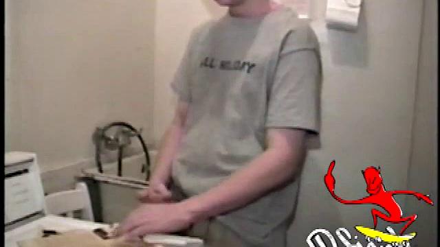 Boy-next-door spreads his new straight porn magazine on top of the washing machine and pulls his cock out of the fly.