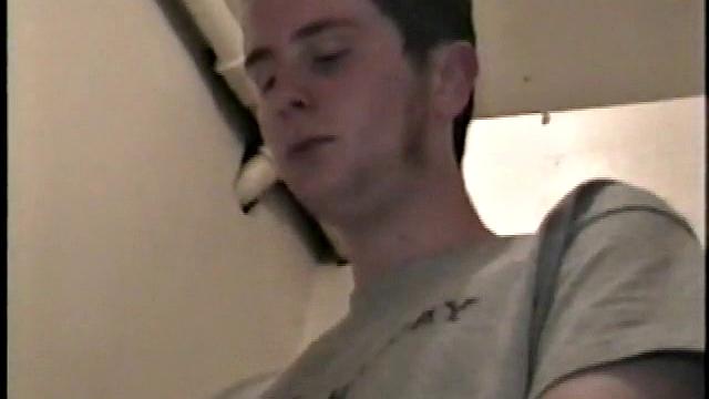 Boy-next-door spreads his new straight porn magazine on top of the washing machine and pulls his cock out of the fly.