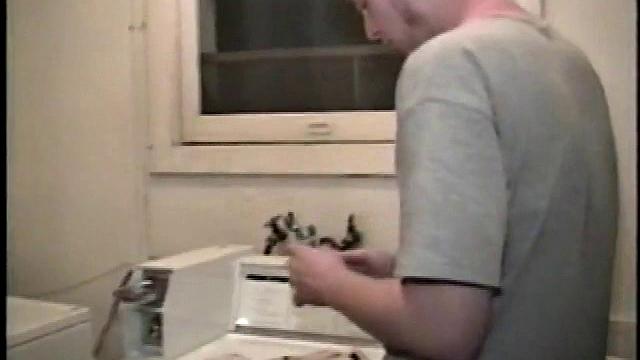 Boy-next-door spreads his new straight porn magazine on top of the washing machine and pulls his cock out of the fly.