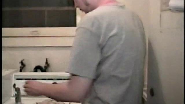 Boy-next-door spreads his new straight porn magazine on top of the washing machine and pulls his cock out of the fly.