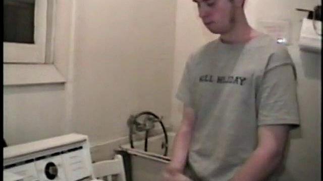 Boy-next-door spreads his new straight porn magazine on top of the washing machine and pulls his cock out of the fly.