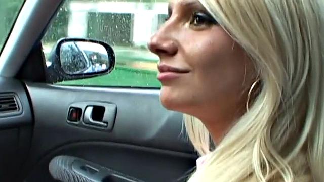 Kinky blonde uses speculum and toys to pleasure herself in close-up car action