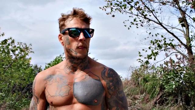 Tattooed gay stud after BJ fucks his BF in the asshole outdoors