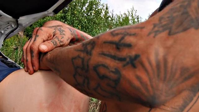 Tattooed gay stud after BJ fucks his BF in the asshole outdoors